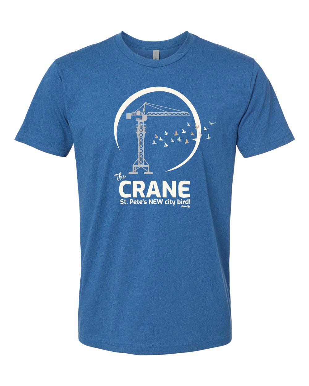 Heather cool blue t-shirt displaying a construction crane with birds flying away, humorously suggesting St. Petersburg's construction boom has replaced the pelican as the city's signature bird