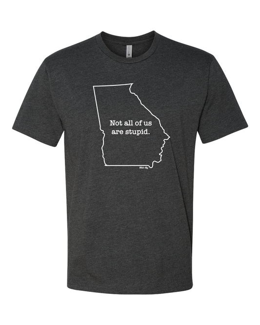 Charcoal heather t-shirt with white text reading 'Not All of Us are Stupid' and Georgia state outline design