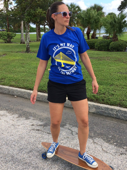 A woman on a skateboard wearing an It's My way or the Skyway t-shirt