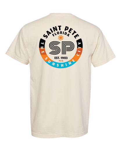 Ivory garment-dyed t-shirt with minimalist skater-style design featuring an SP logo and small sun icon with "Saint Pete, the Sunshine City" text on front and back
