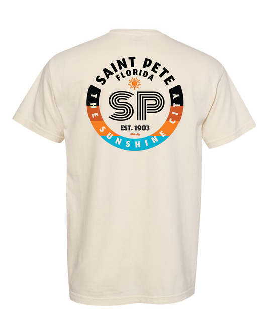 Ivory garment-dyed t-shirt with minimalist skater-style design featuring an SP logo and small sun icon with "Saint Pete, the Sunshine City" text on front and back