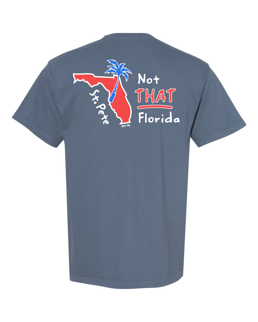 St. Pete Not That Florida T-shirt featuring a red Florida map with a blue palm tree rising from St. Petersburg, symbolizing the city's progressive, artsy identity